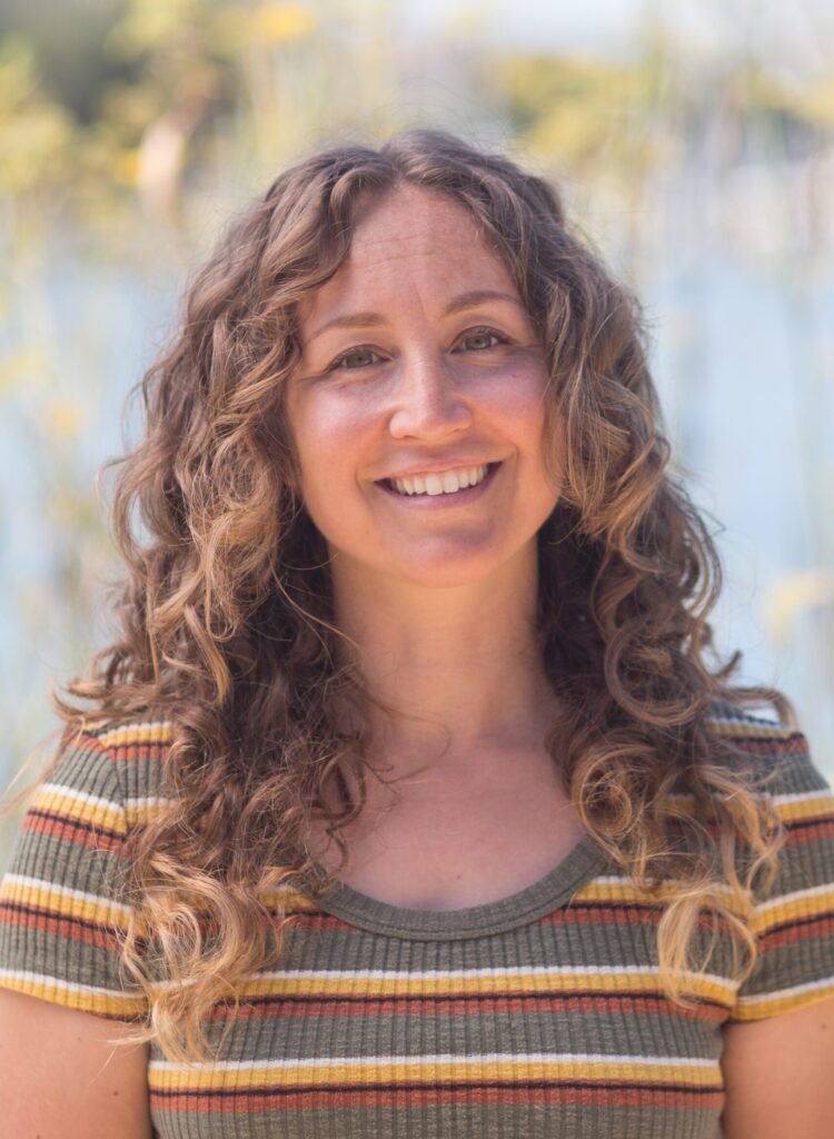 A close-up portrait of Bike East Bay staff member