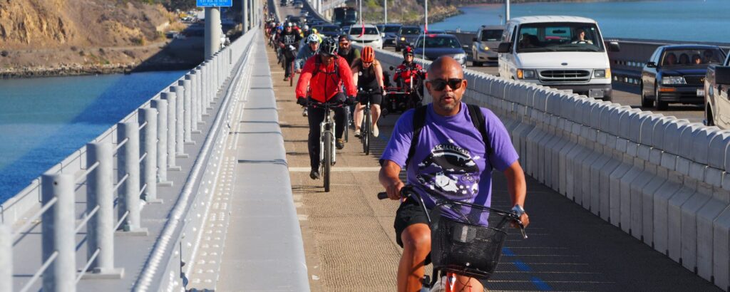 Photo of people on bikes crossing the Richmond-San Rafael Bridge Trail